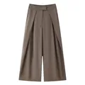 High-quality detail view of stylish brown wide-leg pleated trousers with elegant drape - Khaki