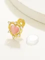 Elegant gold-tone coil ear clip featuring a pink heart stone with sparkling zircon accents - Heart-Shaped Pink Cat Eye Ear Clip (13 14K Imitation Gold 7783)