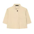 Detail view of a minimalist beige blazer featuring three-quarter sleeves and stand collar - Khaki
