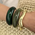 Statement stackable acrylic and gold-tone wave chunky bracelets set for stylish women - Dark Green and Olive Green Acrylic with Gold Wave 3-Piece Bangle Set (6778101HB) / Green Gold Combination