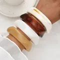 Minimalist acrylic irregular bangle set with elegant neutral marble patterns for women. - Irregular Open Bangle 4-Piece Set (6787101) / Set of 4 / Amber Beige Ivory Combo