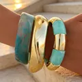 Set of three chunky irregular bangles including blue marbled acrylic and polished gold cuffs - Thick Polished Metal Bamboo Bangle 3-Piece Set (6808401) / Set of 3 / Cyan Marble Gold Combo