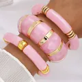Set of 3 pink marbled acrylic bangles with gold-toned metal spacers for women's jewelry - Pink Irregular Open Bangle Set (6644202HB) / Three-Piece Set / Pink Marble/Gold