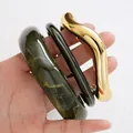 Luxury set of three irregular acrylic green marble and wavy gold bangles for women - Green Marble Bangle 3-Piece Set (6808901) / Green + Gold