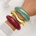 Elegant jewelry set with wavy gold metal and colorful marbled acrylic bangles - Marble Pattern Acrylic Open Bangle (6807802) / Three-Piece Set / Emerald Gold Jujube Red Combo