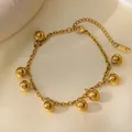 Elegante collana in acciaio al titanio placcato oro 18K con ciondoli a sfera liscia - Bracciale Oro