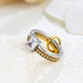 Detailed view of luxury stainless steel double ring set with rectangular cubic zirconia - US 7 / Square Stone Double Loop / Gold & Silver Gradient