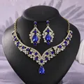 Exquisite vintage palace jewelry set featuring royal blue teardrop crystals for bridal wear - French Luxury Gold + Blue Stone (NS-J6503GHBLUE)