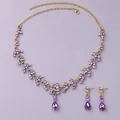 Elegant vintage gold jewelry set featuring purple crystals and teardrop pendants - Vintage Gentle Purple (NS-J6482GP)