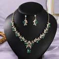 Vintage palace style jewelry set with green gemstones and gold leaf design on black bust - All-match Premium Green (NS-J6597GHG)