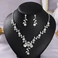 Elegant silver bridal necklace and earrings set with floral rhinestone crystals for weddings. - Photo Party Silver (NS-J6586S)