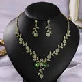 Elegant vintage gold-tone necklace and earring set featuring green floral crystals for weddings - Photo Party Light Green Stone (NS-J6586GLG)