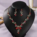Exquisite vintage royal jewelry set featuring red floral rhinestones necklace and earrings - Photo Party Red Stone (NS-J6586GHRED)