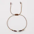 Handmade adjustable brown cord bracelet with natural garnet stones and white pearl - Orange