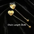 Gold stainless steel heart stud earrings featuring laser texture and elegant chain drop - Textured Heart Tassel / Gold
