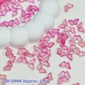 Detailed view of pink butterfly glass beads showing 15x10mm size and 0.6g weight - 15x10mm / Purplish Red