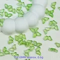 Macro view of green glass butterfly beads with gold foil for DIY crafts, 15x10mm size - 15x10mm / Light Green