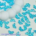 Detailed view of 15x10mm transparent blue butterfly beads for DIY jewelry making. - 15x10mm / Lake Blue