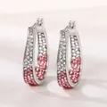 Detailed view of silver hoop earrings featuring a sparkling pink and white crystal gradient - Pink White Gradient