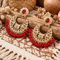 Vintage bohemian gold filigree hollow earrings with red gemstone and bead tassels decoration - Hollow Floral Red Gem Tassel Style (WEH5444)