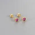 Detailed view of pink heart zircon stud earrings with screw ball backs in gold - Gold / Rose Red