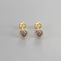 Macro detail of gold heart stud earrings with purple zircon and secure screw backs - Gold / Purple