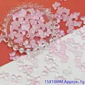 Detail view of translucent pink gradient butterfly glass beads for DIY jewelry crafts - 15x10mm / Light Pink Butterfly (L146#)