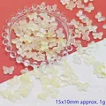 Macro detail of yellow gradient glass butterfly beads for DIY jewelry and earring making - 15x10mm / Yellow Butterfly (L150#)