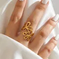 Elegant gold plated stainless steel open ring featuring a double cutout flower design - Gold-Double Hollow Flower Style(2596)
