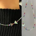 Collier de perles colorées avec pendentifs papillons en verre et breloques vibrantes - Collier Papillon en Verre Soufflé Coloré