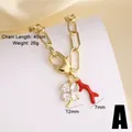 Goldene Halskette mit Zirkon-Glücksklee und rotem Korallenanhänger, Variante A - Schwarzes Kleeblatt + Perle + Schneckenanhänger / Schwarz
