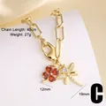 Elegante Goldkette mit Anhängern aus rotem Zirkon-Kleeblatt und Libelle, Stil C - Transparentes Weißes Kleeblatt + Roter Korallenanhänger / Weiß