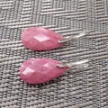 Macro detail of faceted pink pear-shaped teardrop stone earrings on textured background - 13*25*6MM / Red Wood Grain Stone