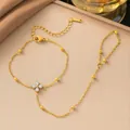 Goudkleurige titaniumstalen handketting met zirkonia klaverbloem voor dames - Ring-Armband met Zirkonia Klaver(E2290) / Goud