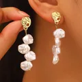 Elegant retro baroque pearl drop earrings with irregular gold finish for women - Long Baroque Artificial Pearl (K-229)