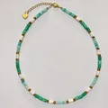 Detailed view of natural stone beaded necklace with green and white beads and gold accents. - Necklace 5 (38+5cm)