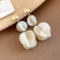 Elegant cream marble pattern acrylic drop earrings with gold textured studs for women - Bean Pod Style / Khaki