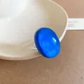 Minimalist vibrant cobalt blue oval resin ring featuring a clear geometric band design - 27# Style