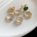 Elegant gold-tone irregular geometric open rings set with emerald-green gemstone. - 7# Oval Style / 6-Piece Set / Gold