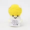 Adorable handmade crochet yellow mushroom doll holding a card with positive message - Yellow Mushroom with White Dots