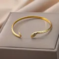 Elegant golden snake-shaped open cuff bracelet in 18K gold plated stainless steel - 18K Gold Snake Style (B1103G-3)