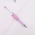 Eleganter lila DIY-Perlenkugelschreiber mit rosa Kristallgriff und glitzernden Strasssteinen - Bruchstein-Stil / Helles Lavendel