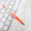 Handgemachter orangefarbener Perlen-Kugelschreiber mit Strass auf weißem Teppich - Sonnenblume / Fluoreszierendes Orange