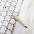 DIY-Kugelschreiber in Creme mit Perlen und bunten Strasssteinen verziert - Sonnenblume / Khaki Beige