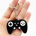 Detailed view of a mini black soft rubber game controller keychain for bags - Simulation Gamepad / Black
