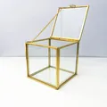 Elegant mini cube glass jewelry storage box with gold-toned metal frame and hinged lid - Medium (8*8*8cm)