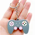 Creative gray game controller keychain with colorful buttons and soft rubber texture - Simulation Gamepad / Gray