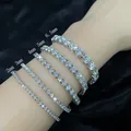Detailed macro shot of shimmering moissanite tennis bracelets in various widths from 2mm to 6.5mm - 16 Inches (Approx. 40cm) / 2mm Zirconia Style (Necklace) / Silver