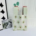 Detail view of the green floral pattern and knitted texture on a large capacity tote bag - Flower Beige