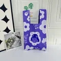 Detailed view of purple knitted flower pattern tote bag for summer travel - Little Girl Purple